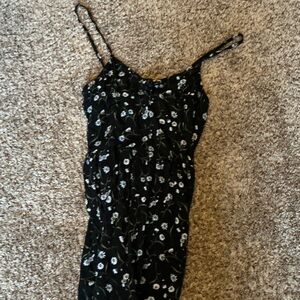 Chic Black Dress with White Floral Design